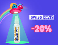 Promotional banner featuring a bottle of Swiss Navy lubricant under a cartoon UFO beam with a rainbow background. The design includes the Swiss Navy logo and a bold “-20%” discount offer on a purple background.