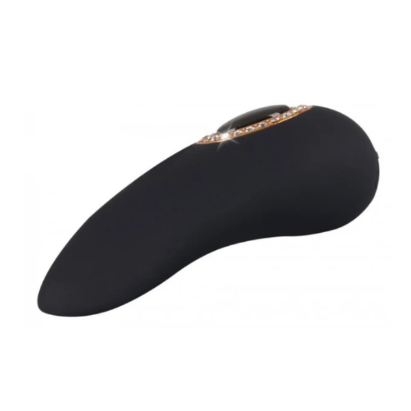 Profile view showing the curved, ergonomic body of the matte black clitoral massager with its sparkling gold rhinestone accent on top.
