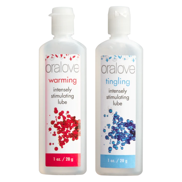 Isolated product shot of two 1 oz (28 g) squeeze bottles standing side-by-side: the Warming intensely stimulating lube with red bubble graphics and the Tingling intensely stimulating lube with blue bubble graphics.