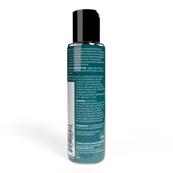 Rear bottle view displaying the full printed product label on the bottle, including directions for use, warnings, ingredients list, barcode, and manufacturer details.
