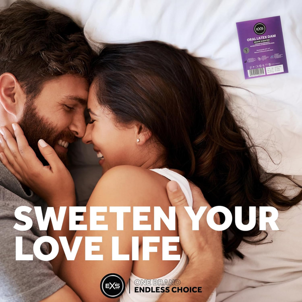 Lifestyle photo of a smiling couple embracing in bed. Bold text overlay reads "SWEETEN YOUR LOVE LIFE," accompanied by a single-pack EXS Grape Scented Oral Latex Dam in the upper right corner.