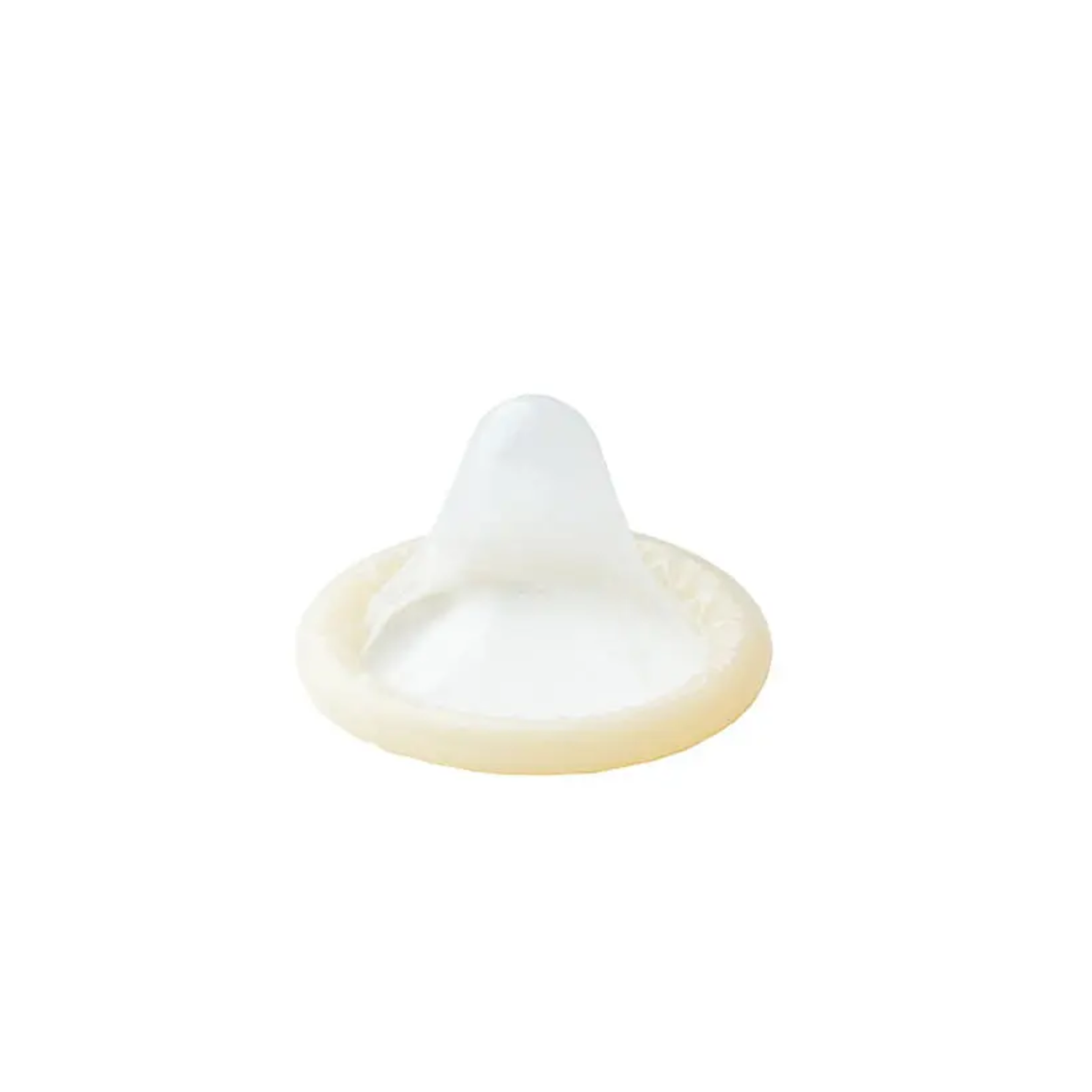 Studio shot of a single unrolled transparent latex condom standing upright on its base against a plain white background.