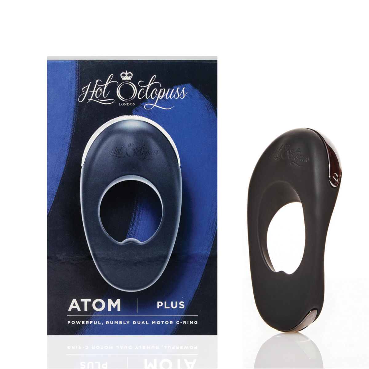 Product set view showing the black Hot Octopuss Atom Plus vibrating c-ring standing next to its blue and black retail packaging box.