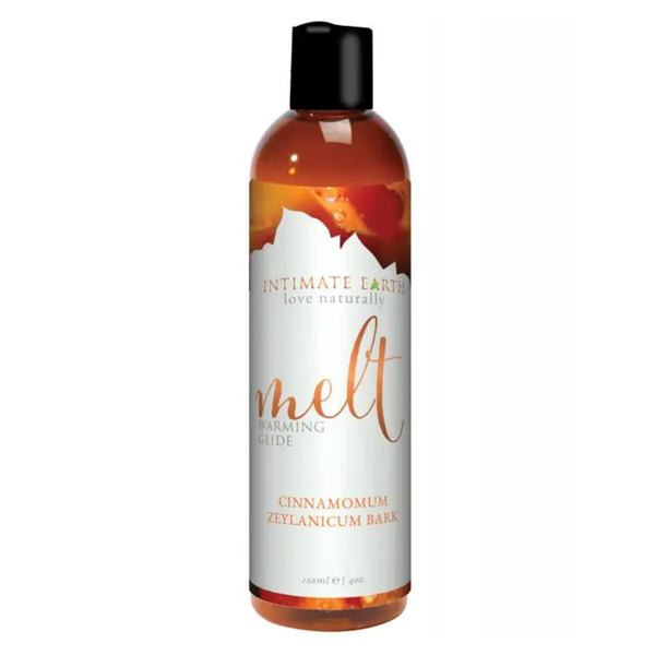 Direct studio shot of the 120 ml (4 fl oz) amber bottle of Intimate Earth Melt warming glide featuring Cinnamomum Zeylanicum bark extract and a black disc cap.