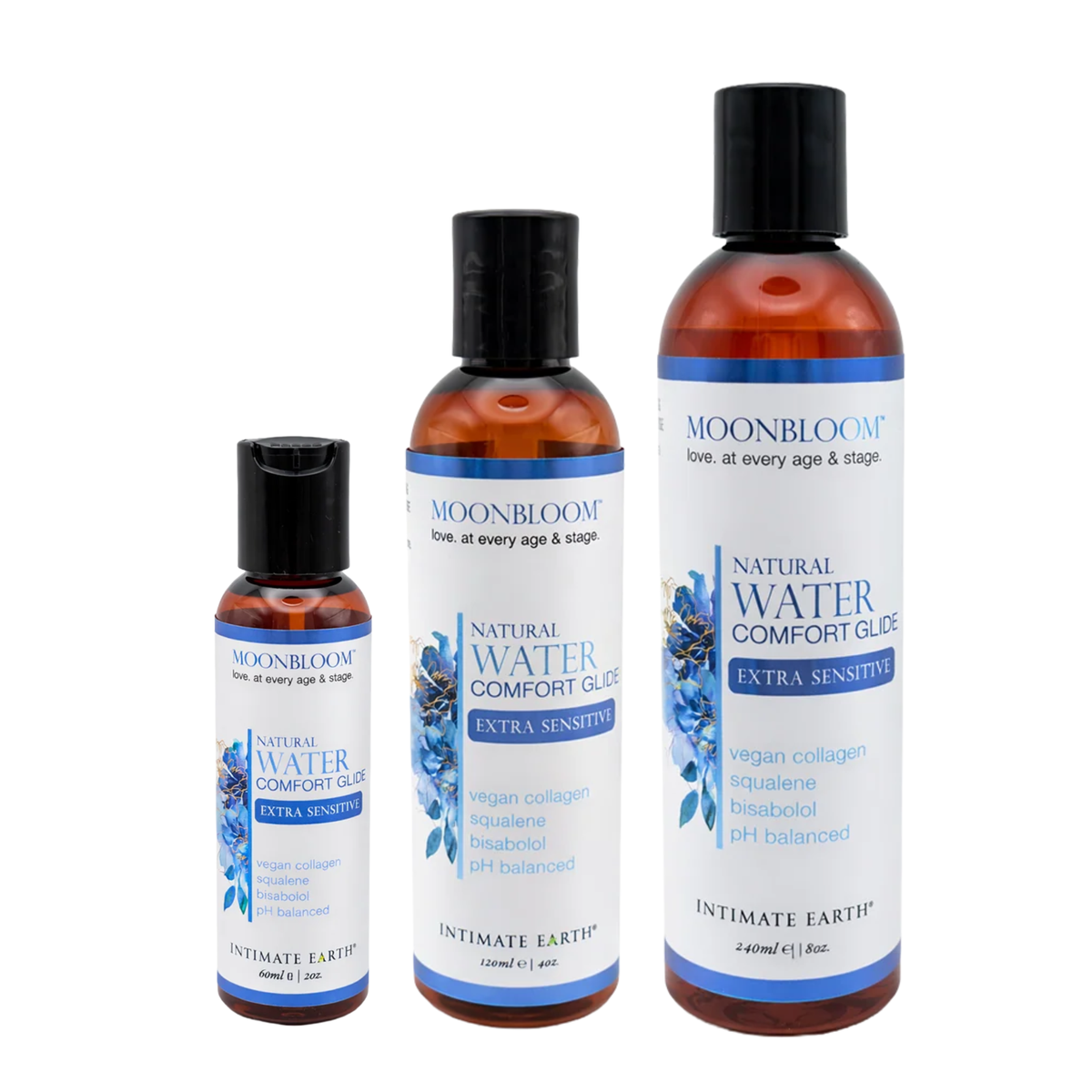 Size comparison view showing three amber bottles of Intimate Earth Moon Bloom water comfort glide standing side by side in 60 ml (2 fl oz), 120 ml (4 fl oz), and 240 ml (8 fl oz) capacities. Main image