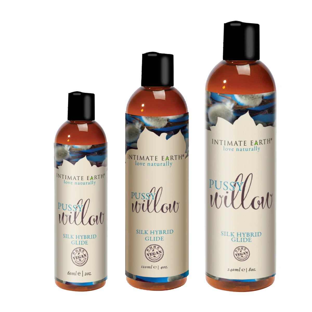Size lineup shot displaying three amber bottles of Intimate Earth Pussy Willow silk hybrid glide standing side by side in 60 ml (2 fl oz), 120 ml (4 fl oz), and 240 ml (8 fl oz) capacities. Main image