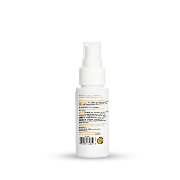 A white pump bottle of hair product shown from the back, featuring a white label with orange text and a barcode, set against a plain white background.