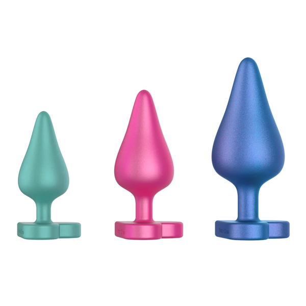 Isolated product line-up of the three graduating sizes—teal small, pink medium, and metallic blue-purple large—standing in a row against a white background.
