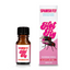 A small, brown dropper bottle of Spanish Fly Hot Fly 0.34 fl. oz./10 ml stands next to its retail box. Both the bottle label and the box feature a bright pink and white design with bold, script text. 