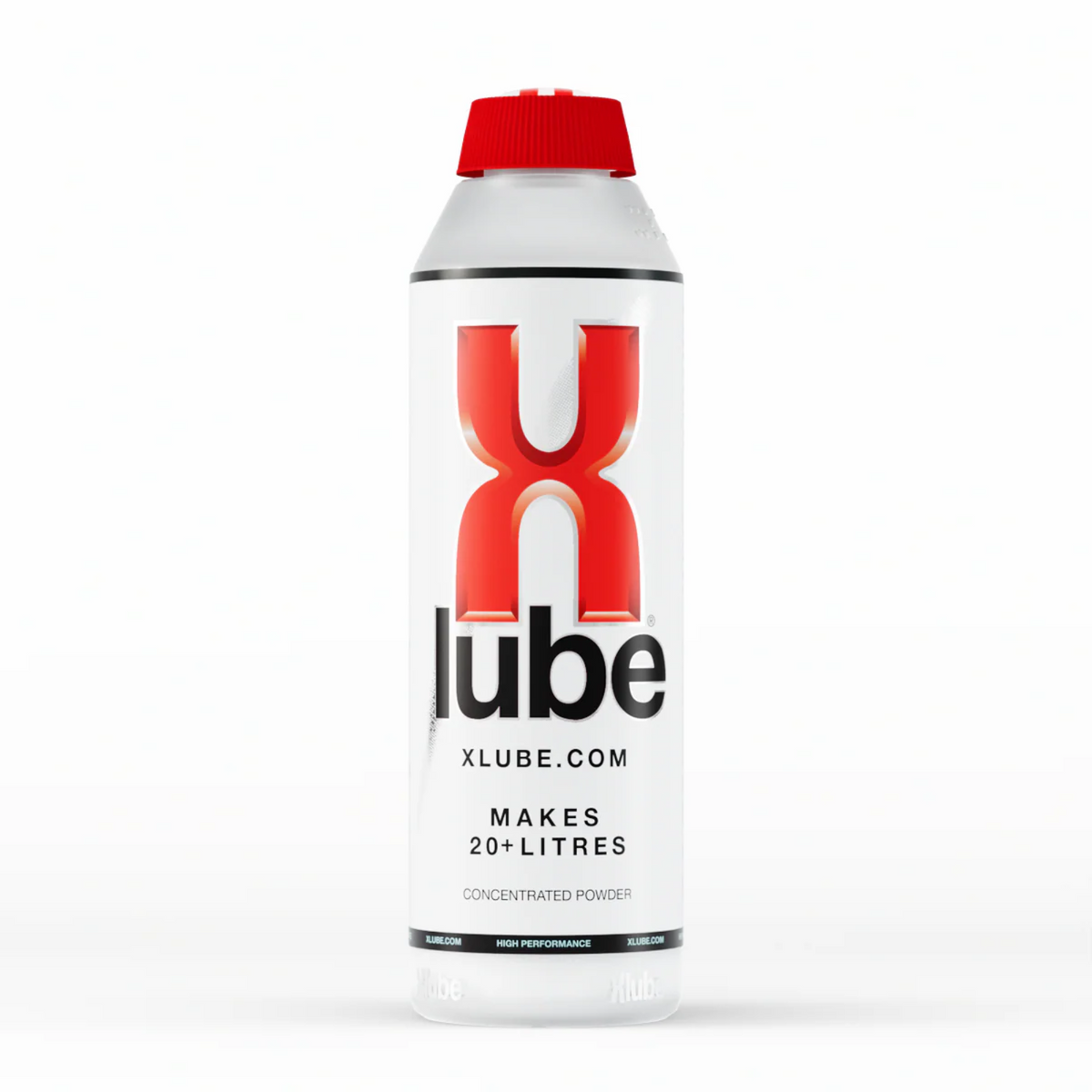 A vertical shot of a clear plastic bottle of X Lube powder lubricant in the white background. The bottle has a red cap and is primarily white with red and black text. The large red "X" and black "lube" logo is prominent in the center. Smaller text below the logo reads "Xlube.com" and "MAKES 20+ LITRES / CONCENTRATED POWDER".