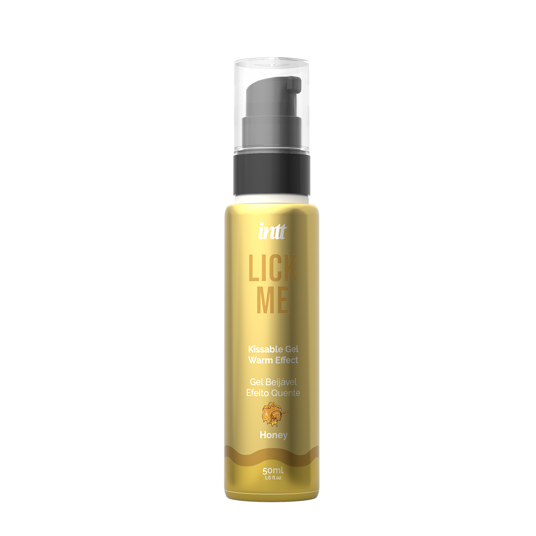 Gold bottle with black cap on a white background Main image