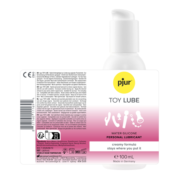 Flat-lay packaging view displaying the front and back label of the 100 ml (3.38 fl oz) Pjur Toy Lube bottle with ingredients, directions, barcode, and CE mark.