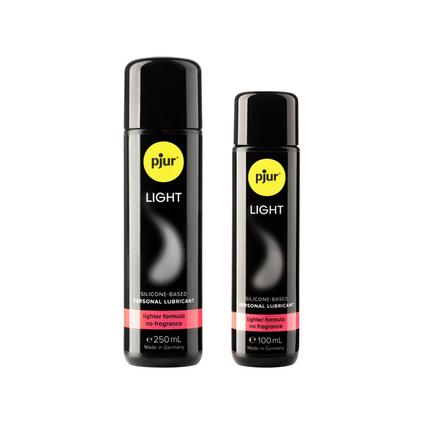 Two black bottles of Pjur Light silicone-based personal lubricants with a yellow logo and pink label indicating "lighter formula no fragrance".